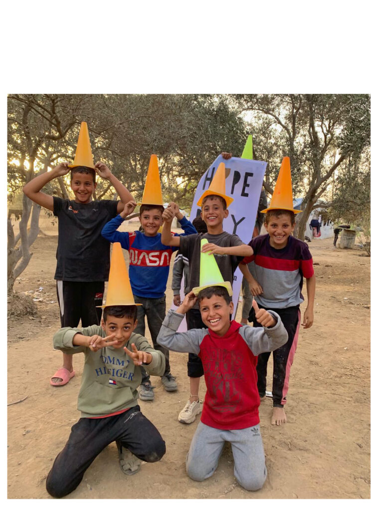 Deir El Balah games_cones on heads